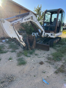 orchard Bobcat excavator